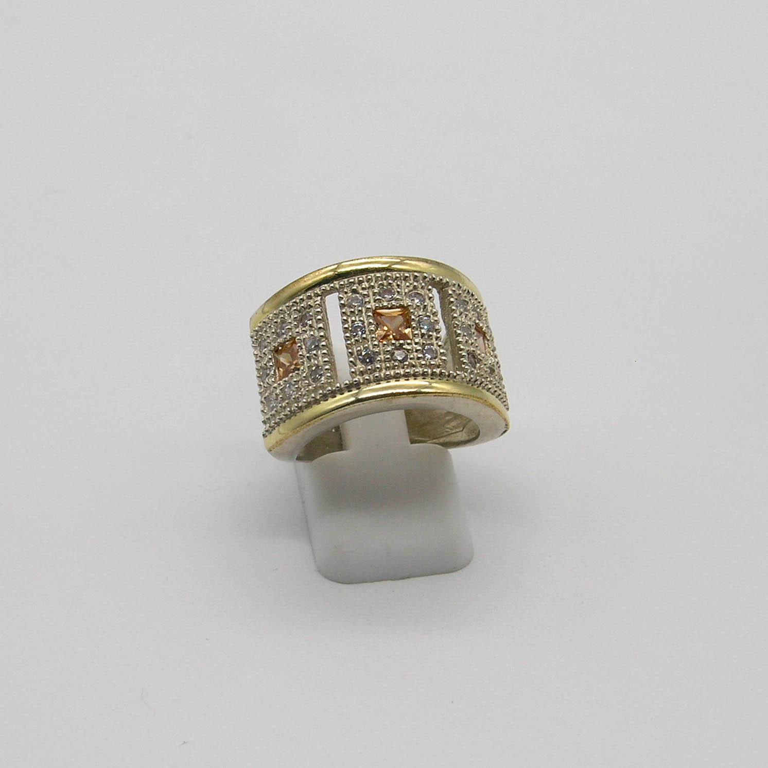 ANILLO CON PIEDRAS /PLATA Y ORO 