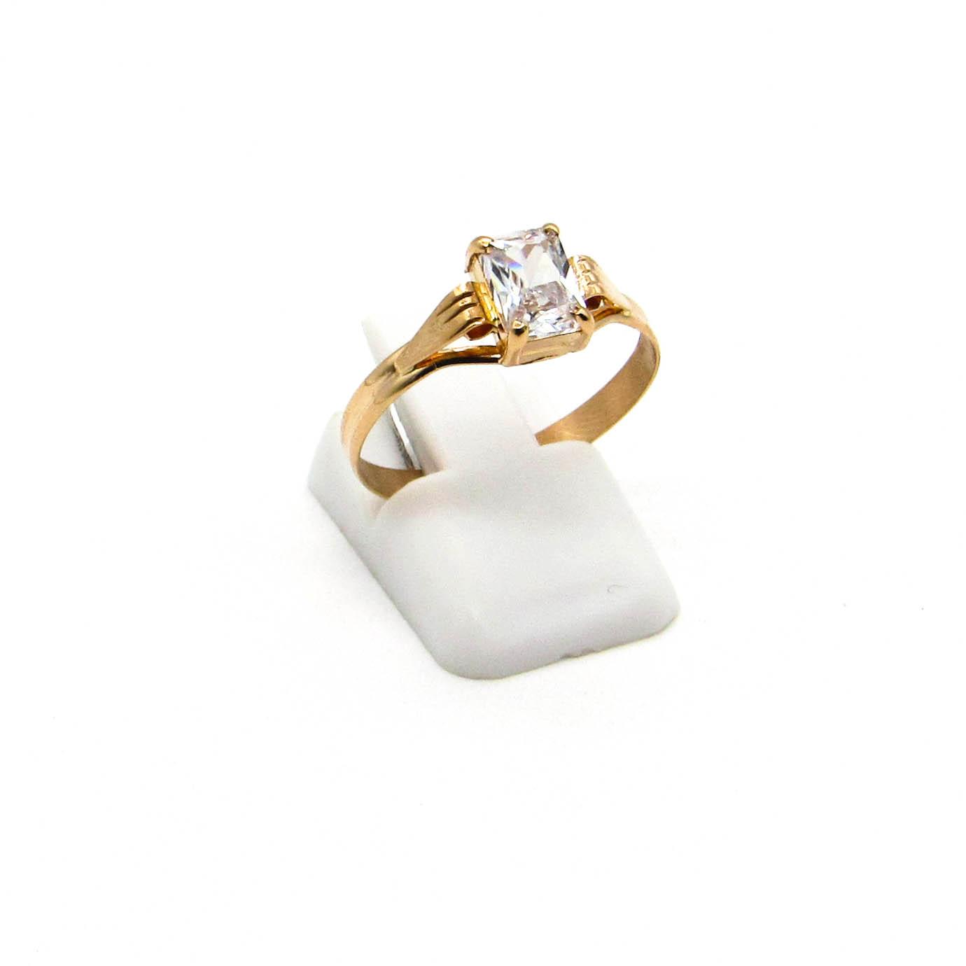 ANILLO SOLITARIO BAGUETTE GRIFAS /O.ROJO