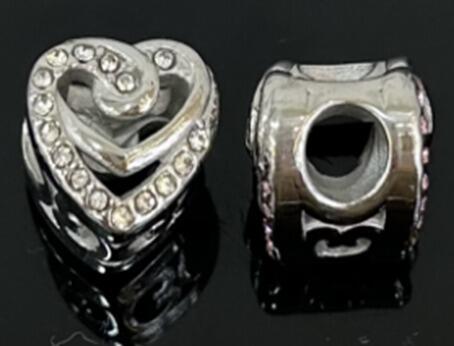 DIJE CHARM DOBLE CORAZÓN CUBIC / ACERO 