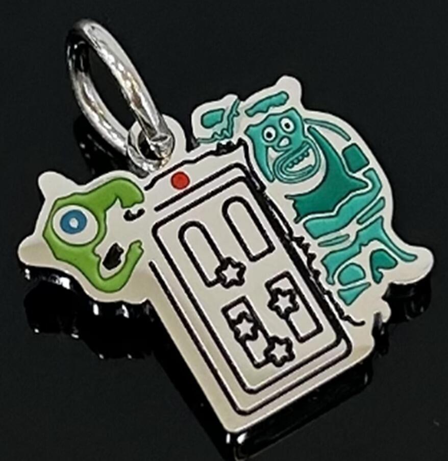 DIJE CHARM MONSTER INC. ESMALTE / ACERO