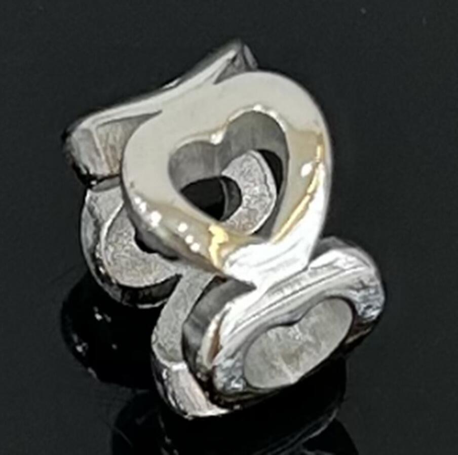 DIJE CHARM CORAZONES CALADO / ACERO