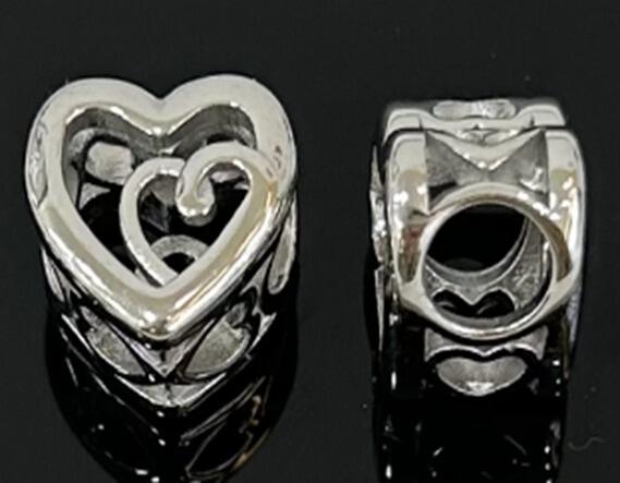 DIJE CHARM CORAZÓN CALADO / ACERO