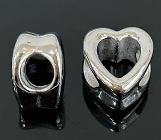 DIJE CHARM CORAZÓN CALADO / ACERO